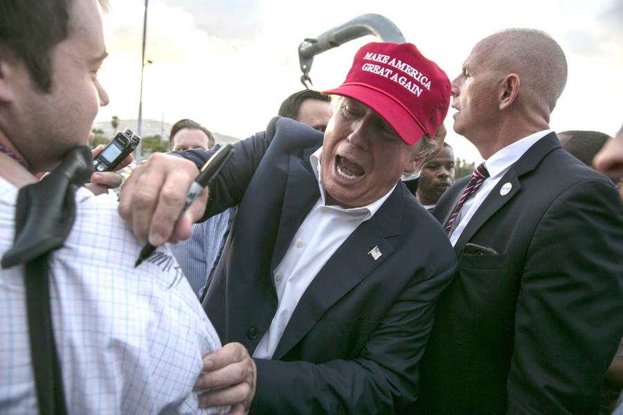 Republican presidential hopeful Donald Trump stops to give an autograph after speaking to supporters aboard the USS Iowa battleship in Los Angeles on Tuesday, Sept. 15, 2015. (Robert Gauthier/Los Angeles Times/TNS)