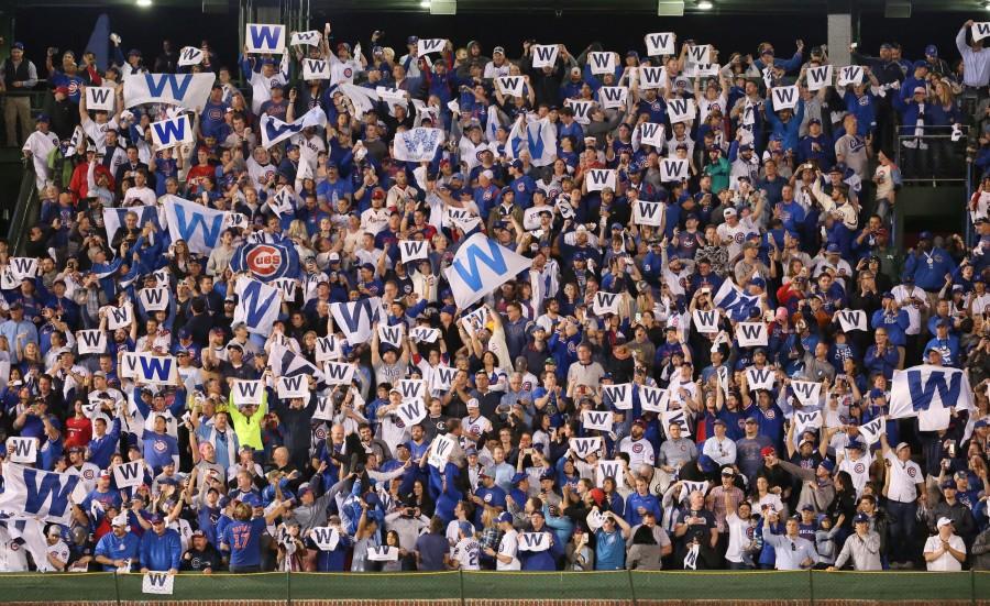 Chicago+Cubs+fans+in+the+bleachers+wave+their+%26quot%3BW%26quot%3B+signs+after+Game+3+of+the+National+League+Division+Series+between+the+St.+Louis+Cardinals+and+the+Chicago+Cubs+on+Monday%2C+Oct.+12%2C+2015%2C+at+Wrigley+Field+in+Chicago.+%28Chris+Lee%2FSt.+Louis+Post-Dispatch%2FTNS%29