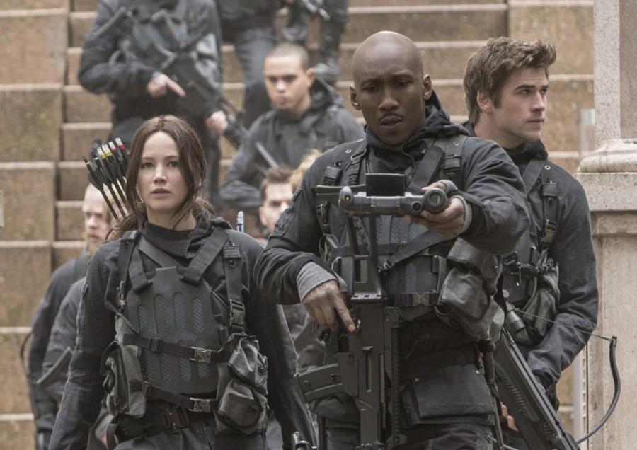 Jennifer Lawrence, Mahershala Ali and Liam Hemsworth in "The Hunger Games: Mockingjay -- Part 2." (Photo courtesy Lionsgate/TNS)