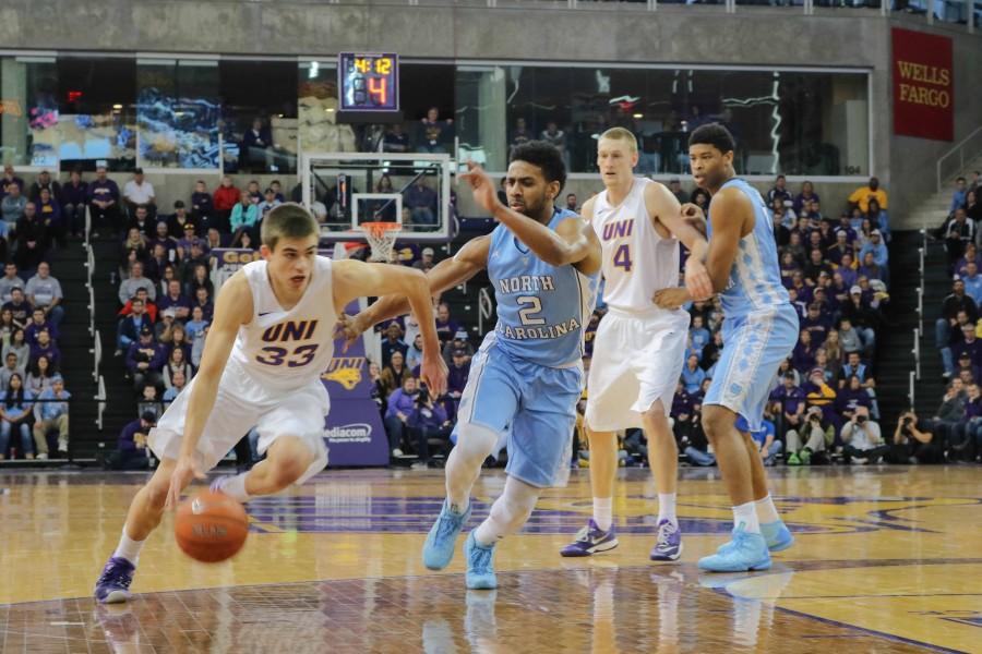 Wyatt Lohaus (33) dribbles by a UNC defender. The Panthers come back to the McLeod Center on Saturday, Jan. 16 to play Loyola. 