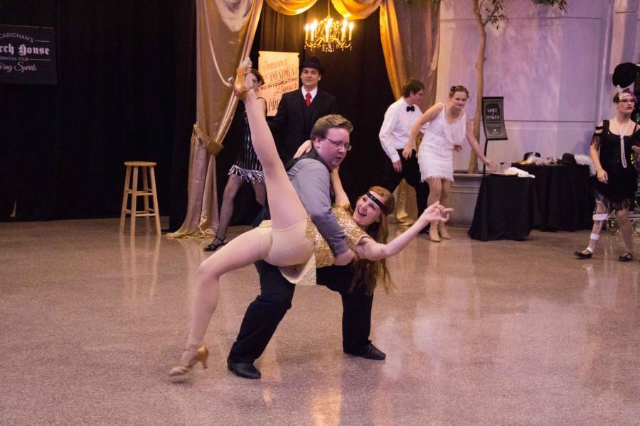 Dancers dress in 1920s attire and swing dance at the Hot Sardines performance, participating in another period specific event that UNI Ballroom and Swing has been a part of this year.
