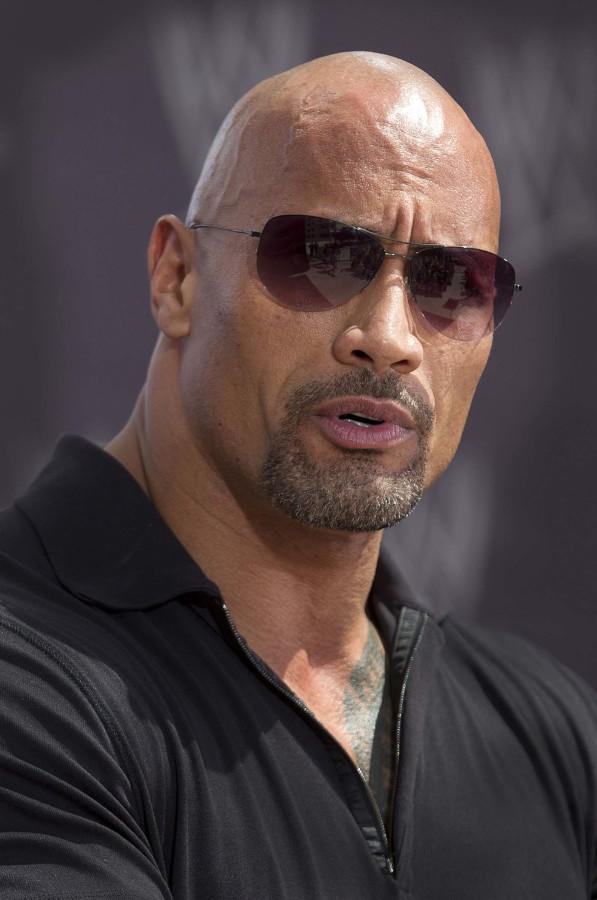 Dwayne+%26quot%3BThe+Rock%26quot%3B+Johnson+speaks+about+his+upcoming+match+with+opponent+John+Cena+during+the+WrestleMania+28+press+conference+Wednesday%2C+March+28%2C+2012%2C+in+Miami+Beach%2C+Florida.+%28C.W.+Griffin%2FMiami+Herald%2FMCT%29
