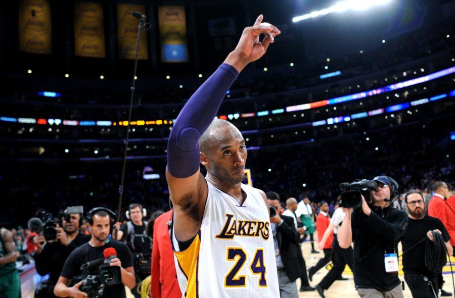 Kobe+Bryant+waves+to+the+crowd+after+the+Lakers+loss+to+Boston+Celtics.+Bryant+has+averaged+25+points+over+his+20-year+career.+