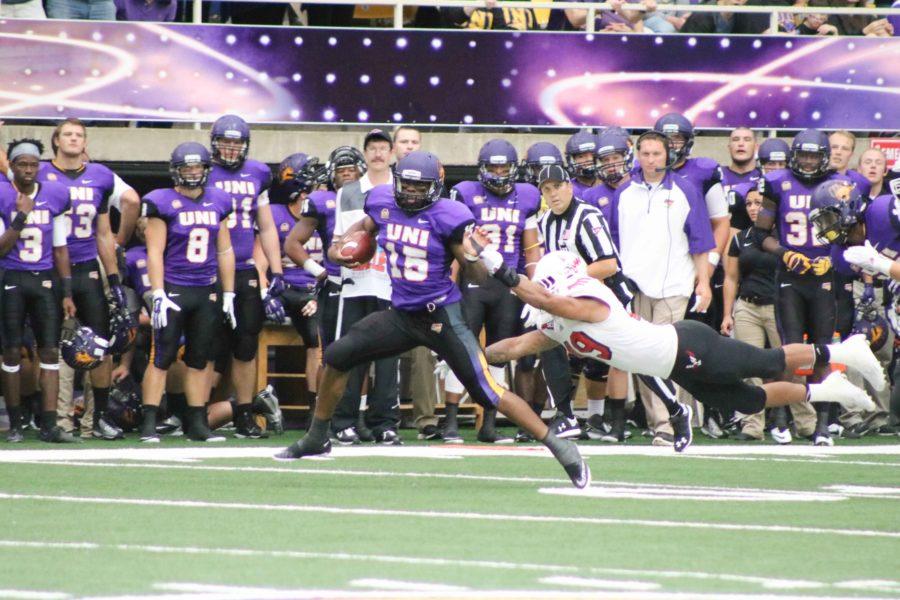 UNI quarterback Aaron Bailey breaks a tackle against Eastern Washington. Last season, Bailey pasted and rushed over 1000 yards. 