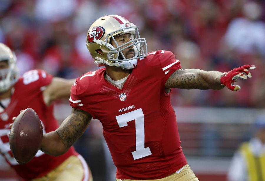 Colin+Kaepernick+throws+a+72+yard+touchdown+pass+against+Baltimore+Ravens+on+Sunday%2C+Oct.+18th.+Kaepernick+refused+to+stand+for+the+national+anthem+prior+to+the+preseason+matchup+against+the+Green+Bay+Packers+Aug.+26.+Green+Bay+won+the+game+21-10