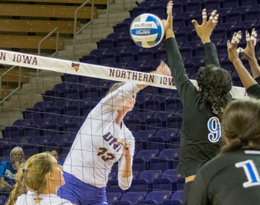Heather Hook (10) sets up an opportunity for Kayla Haneline (13) to spike the ball against Indiana State. 