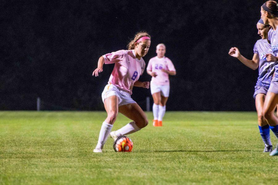 Hannah McDevitt (8) shows off some of her footwork against the Bulldogs. McDevitt is currently tied at second for most goals scored on the team (7). 