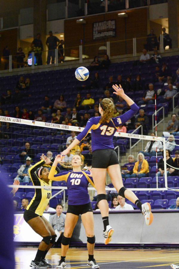Kayla Haneline (13) jumps up to spike the ball against the Shockers. Haneline currently leads the Panthers in total points scored at 266.5