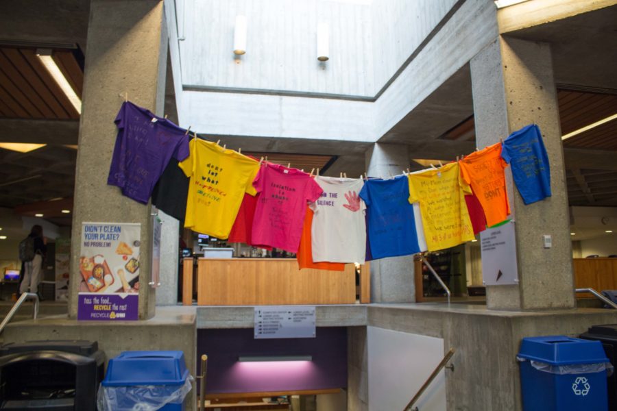 T-shirts with messages such as: Its not consent if you make me afraid to say no hang in the Maucker Union. UNIs Womens and Gender Studies program partnered with Student Wellness Services for the Clothesline Project last week.