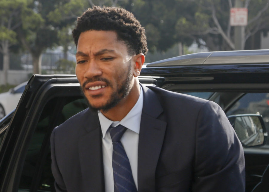 New York Knicks point guard Derrick Rose arrives at the Federal Courthouse in Los Angeles. Just yesterday, Rose and his friends were acquitted on charges of assaulting his ex-girlfriend. 