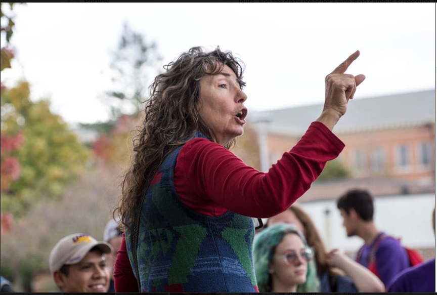 Sister Cindy, a street protester, speaks to UNI students outside the Rod Library Oct. 17. Day says students made hurtful comments toward her while she was preaching her divisive sermon.