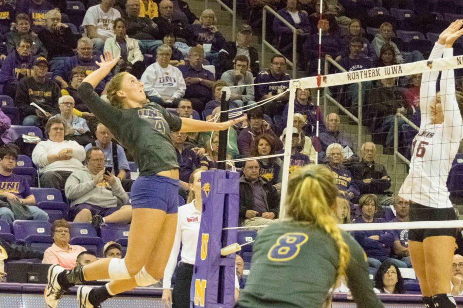 Bri Weber (4) and Ashlee Sinnott (8) set up for a spike. The Panthers secured an invitation to the Missouri Valley Conference tourney with a weekend match win.