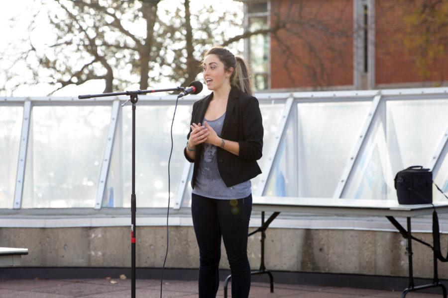 Sabrina Santos, a senior economics, finance and history major, helped organize the rally that was held on the Maucker Union rooftop yesterday. 