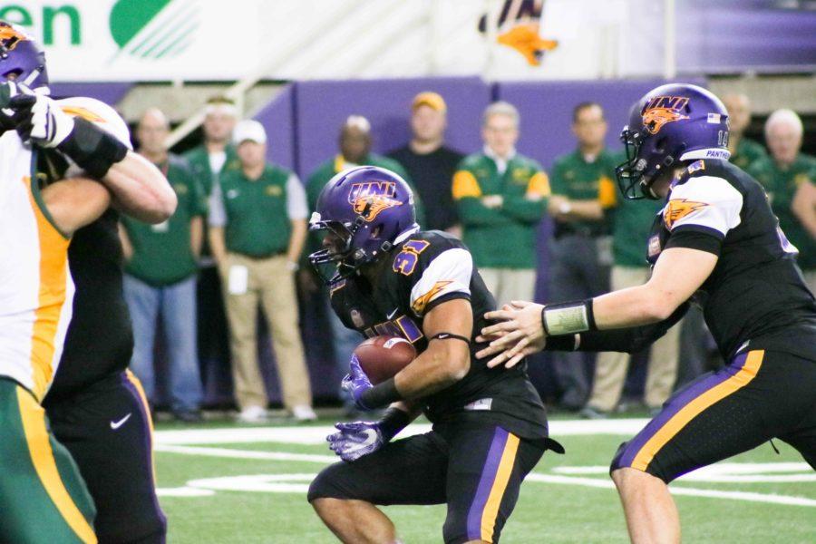 Michael Malloy (31) receives the handoff and looks for an opening against North Dakota State. In their game against Indiana State, Malloy finished the night with 84-rushing yards and three touchdowns.