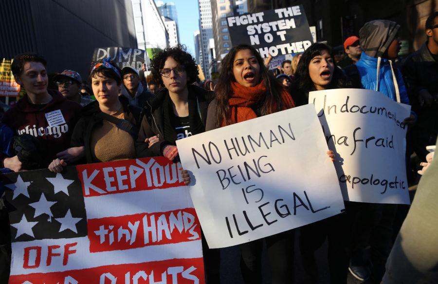 Hundreds march through downtown Chicago Nov. 12 in protest of the presidential election of Donald Trump. One sign reads FIGHT THE SYSTEM NOT EACH OTHER [sic]. Columnist Cobb urges those unhappy with Trumps win to blame institutions and not individuals for this result. 
