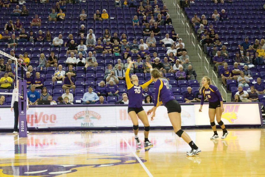 Heather Hook (10) sets up Kayla Haneline (13) alongside teammate Ashlee Sinnott (8) during an early-season home game. UNI finished the regular season 24-10. (14-4 within the MVC, 12-3 at home and 8-5 on the road)