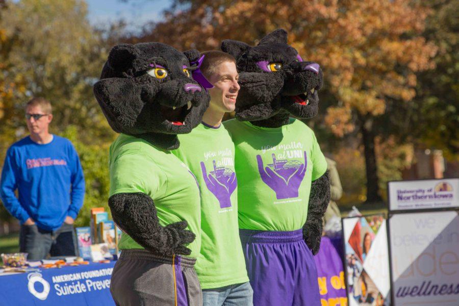 NISG President, Hunter Flesch, stands with UNIs mascots at the first Mental Health Awareness week earlier this semester. Some students have questioned the events success. Columnist Friel wonder whether its fair to criticize event planning skills of NISG leaders.