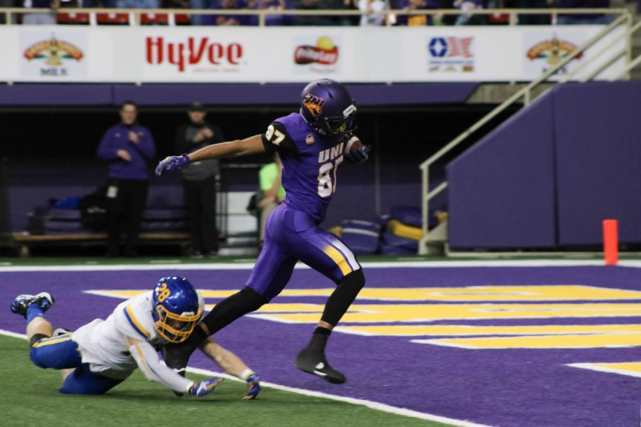 Freshman Jalena Rima (87) breaks a couple of tackles and makes his way to the endzone for a UNI touchdown against South Dakota State.