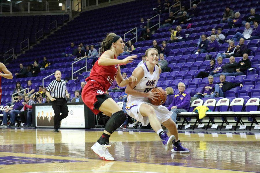 Ellie Herzberg, redshirt sophomore, gets ready to shoot. Her current shooting average is 10.3 points.