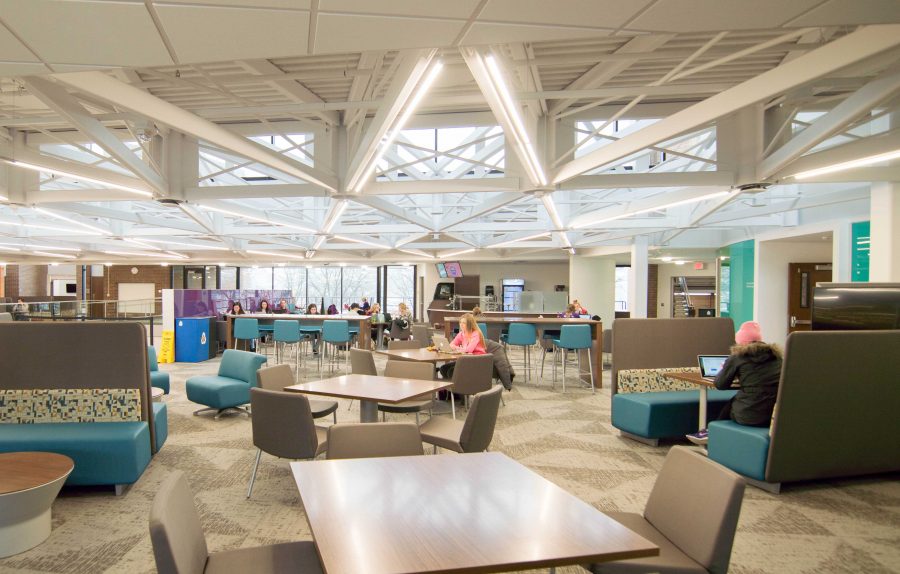 The main space of Schindler is large, open and bright. Tables, chairs and booths are available for students to lounge around.