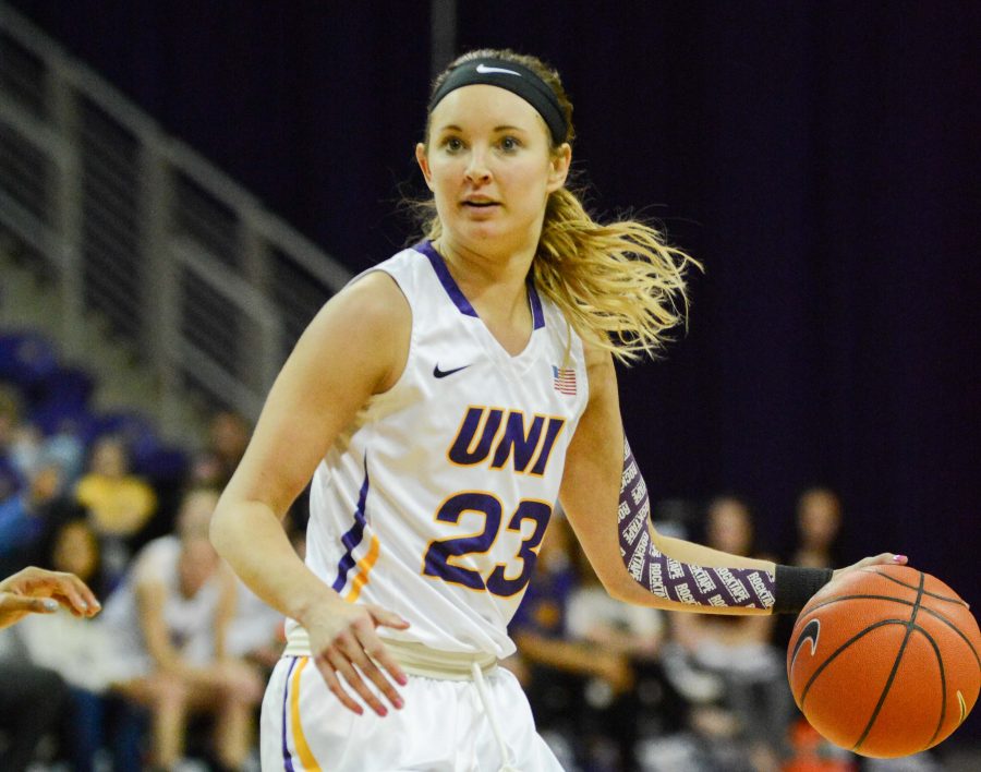 Kennedy Kirkpatrick, No. 23, dribbles down the court.