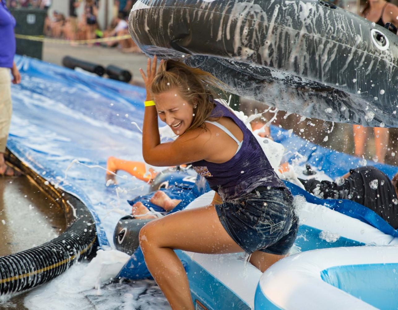 Students slip and slide on Hill