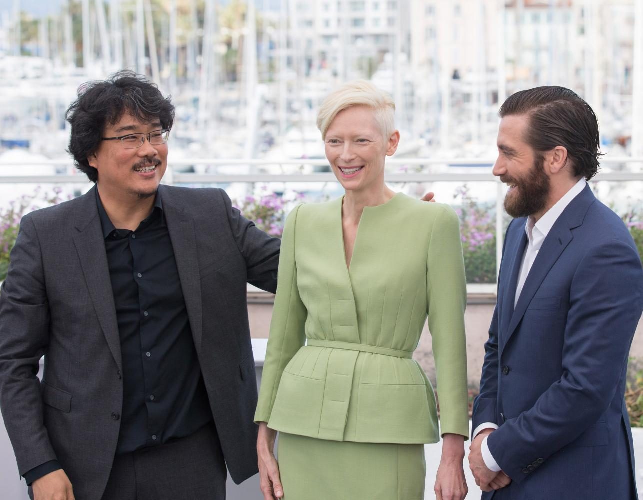 Pictured are director Bong Joon-Ho (left), actress Tilda Swinton (center) and actor Jake Gyllenhaal (right) from the film Okja. The film has an 86 percent fresh rating on Rotten Tomatoes.