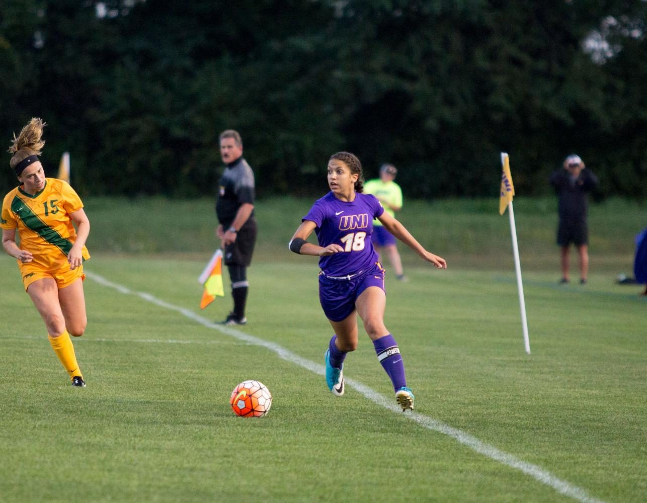 Kelsey Hansen, No. 8, looks ahead to get ready to pass the ball. She has seen a total of 457 minutes of play time in all seven games of the current season.