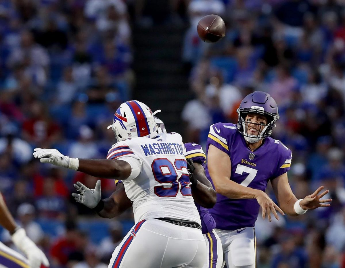Minnesota Vikings quarterback Case Keenum (7) looks to pass in the second quarter against the Buffalo Bills at New Era Field in Orchard Park, New York.