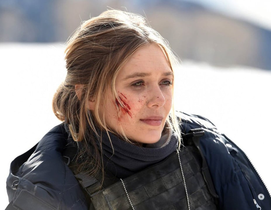 Elizabeth Olson stars as FBI Agent Jane Banner in the new crime drama Wind River, directed by Taylor Sheridan. The film has received critical acclaim and currently carries an 86 percent approval rating on Rotten Tomatoes.