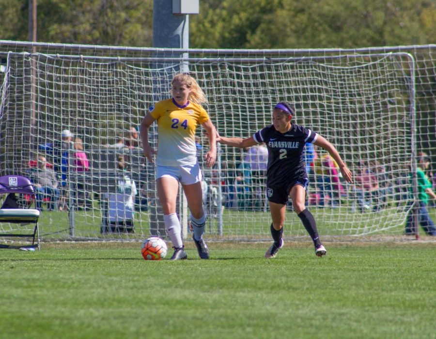 Sarah Brandt (24) bodies an opposing defender at a recent home game in Cedar Falls.