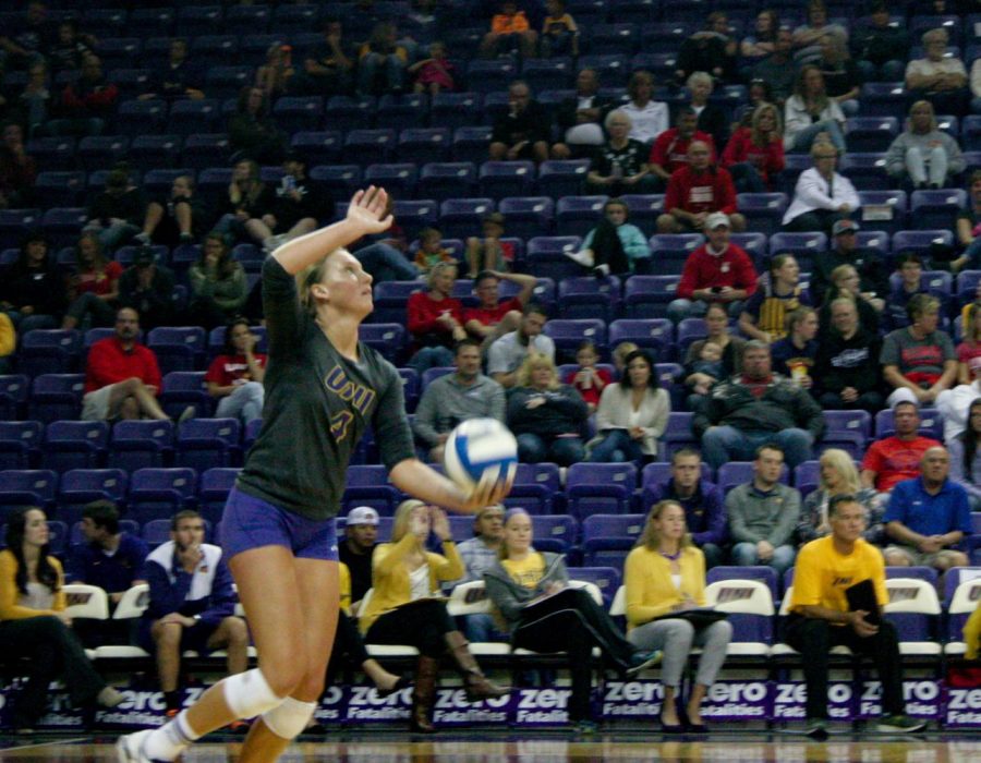 Junior Bri Weber (4) serves the ball during a recent home game.