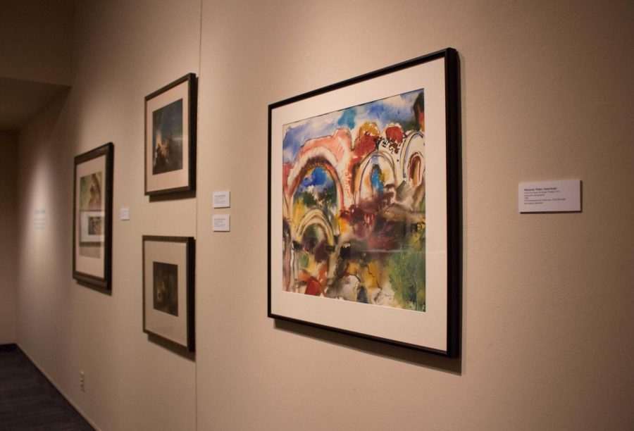 The Women as Makers exhibit in the UNI Gallery of Art showcases a variety of artwork, including paintings, pottery and textiles, created by women.