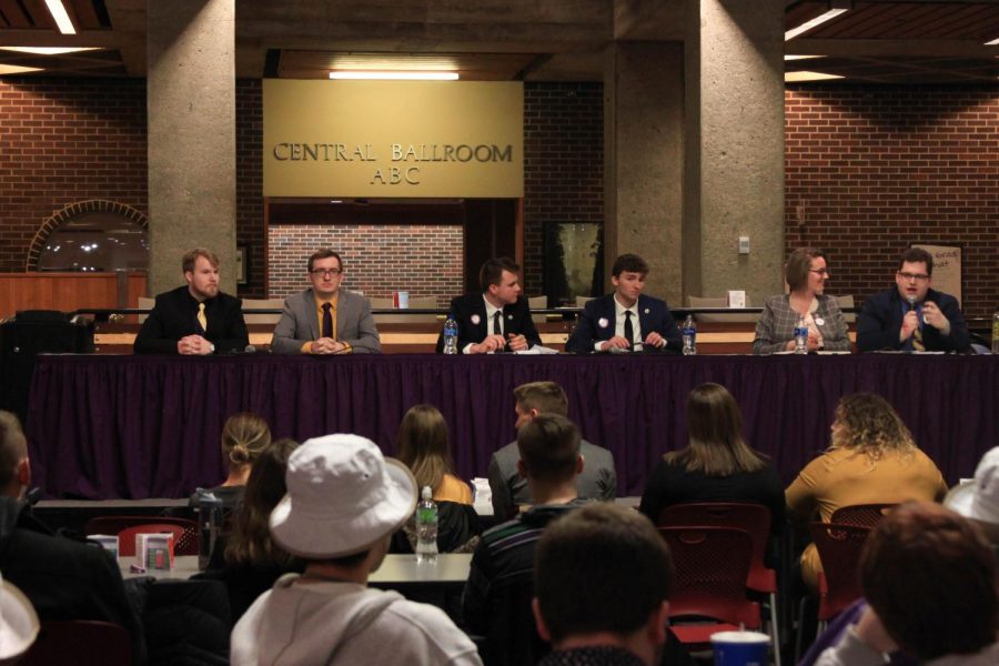 Vice presidential and presidential candidates Chad Schafer and Seán Dugan, Cole Malcolm and Tristan Bernhard and Kristen Ahart and Drew Stensland debate important issues at the NISG debate on Feb. 22. 