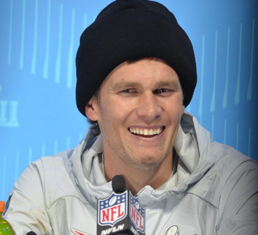 Tom+Brady+sits+down+during+a+press+conference+in+Minnesota.