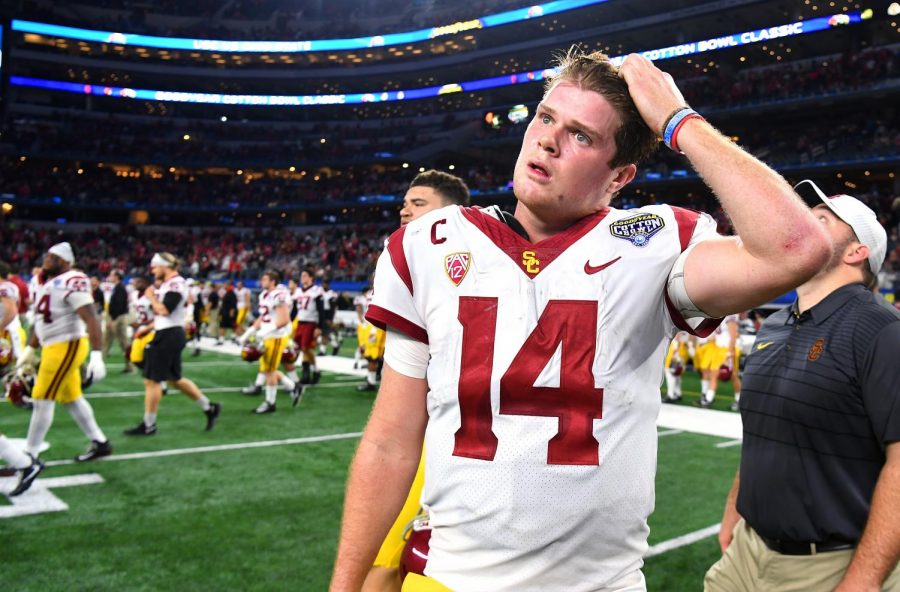 Sam Darnold (14), USC quarterback, walks off the field after a 24-7 loss against Ohio State in the Cotton Bowl.