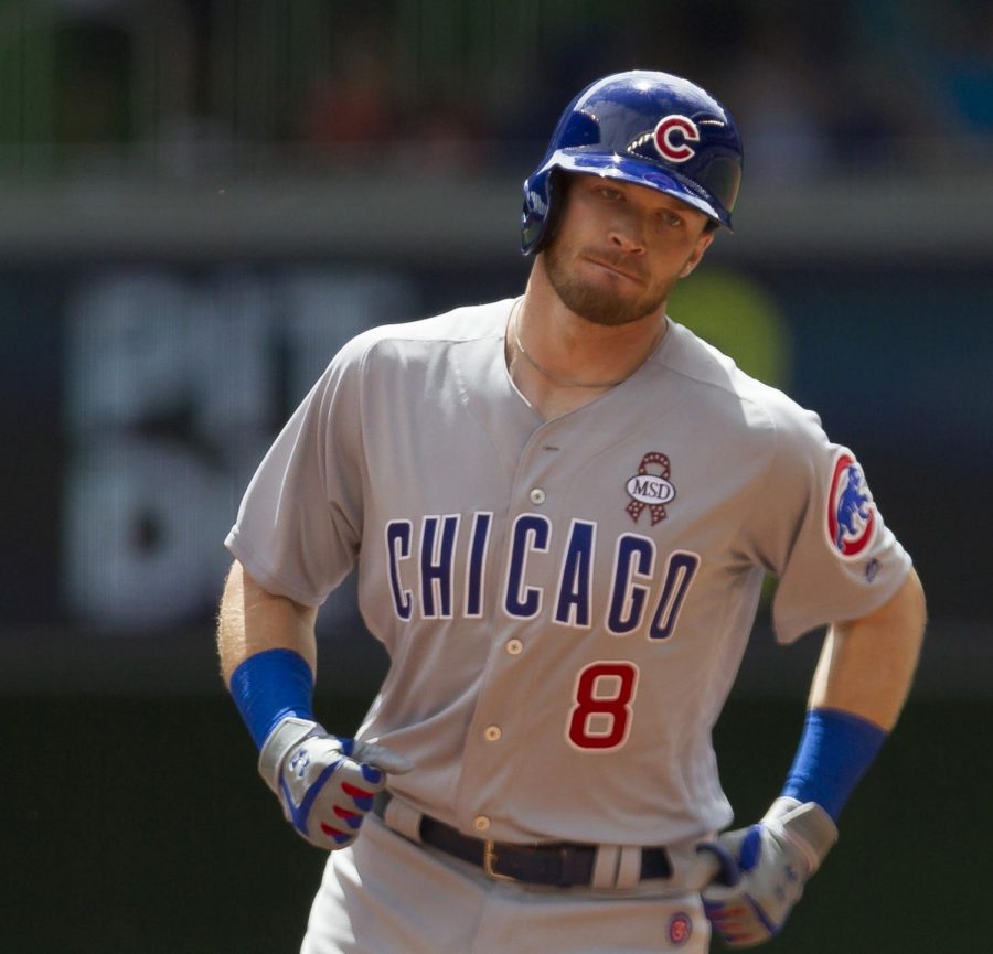 Ian+Happ+runs+the+bases+after+hitting+a+home+run+on+the+first+pitch+of+the+2018+season.