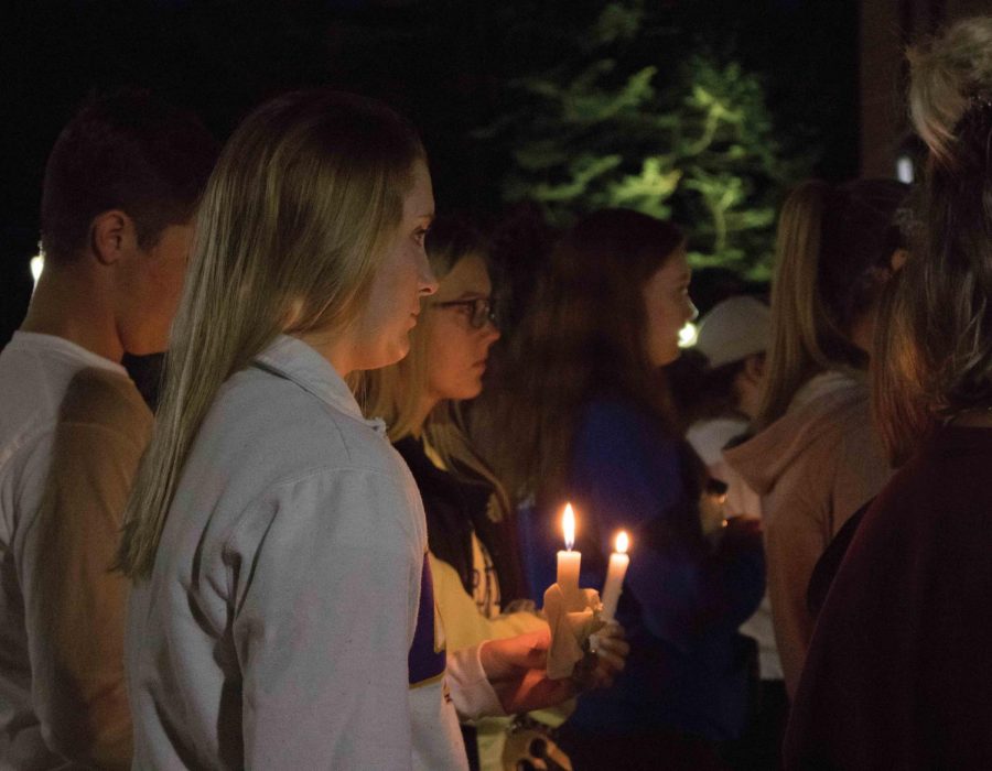 Nearly 120 students gathered at the Campanile on Wednesday, August 22 for a candlelight vigil for those who have gone missing, including Mollie Tibbetts and Jake Wilson.