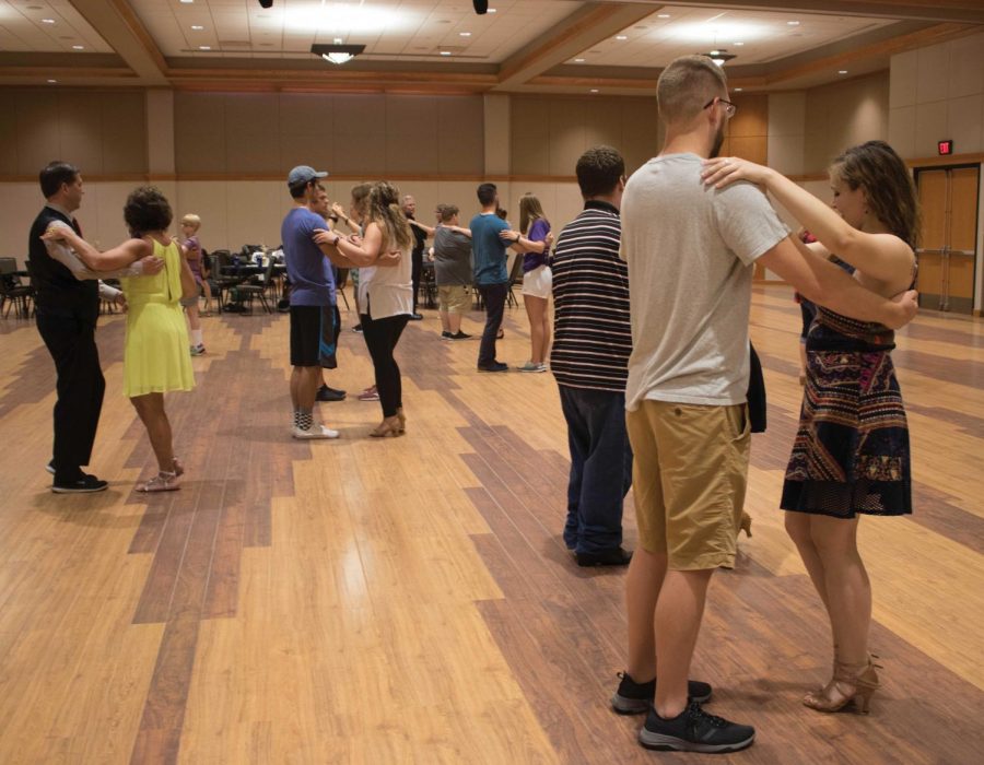 Richard Leipold, senior movement and exercise science major, taught East Coast swing and waltz lessons for UNI Ballroom/Swings annual Welcome Ball last Saturday, Aug. 18. UNI Ballroom/Swing provides free lessons every Tuesday and Thursday from 7-8 P.M.