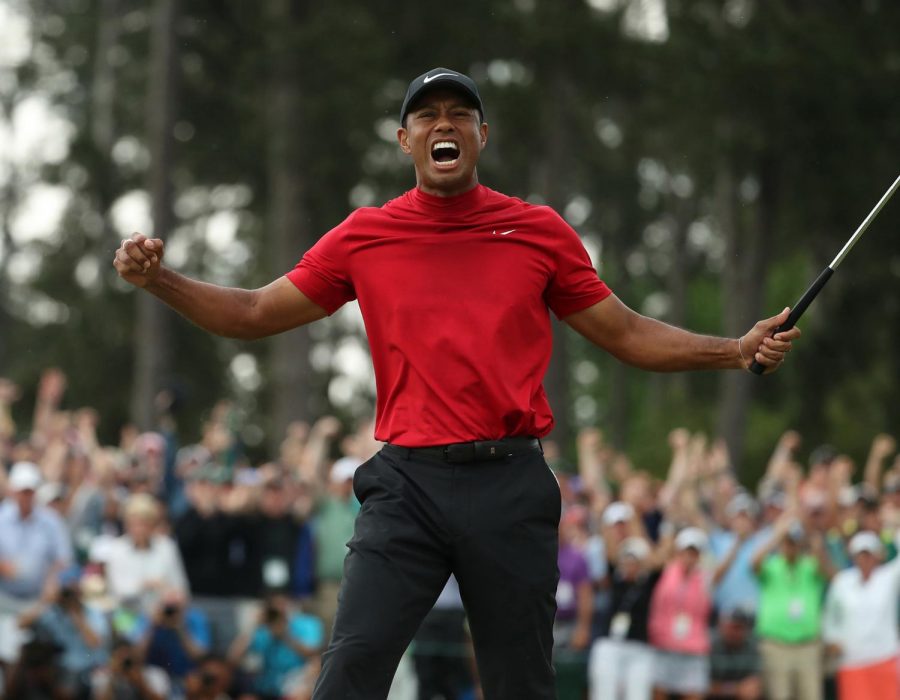 Tiger Woods claims first major title since 2008