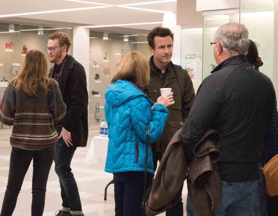 UNI alum and filmmaker Brendon Leonard mingles with attendees of 2019’s MountainFilm On Tour at UNI.