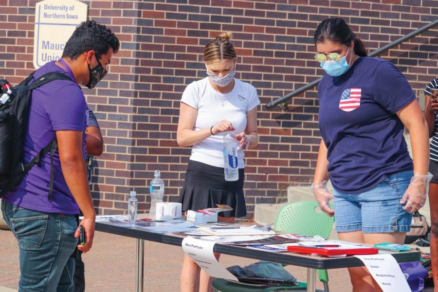 Students stop at a registration table outside Maucker Union at the Make Campus Great Again event on Monday, Aug. 24. 