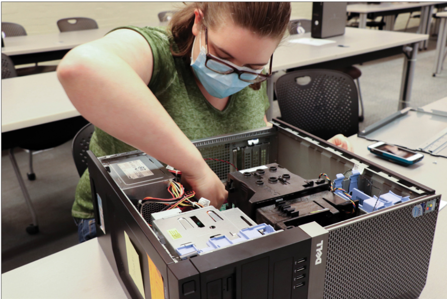 With the help of provided manuals, students were able to take apart and rebuild surplus computers during Take Apart a Computer night. 