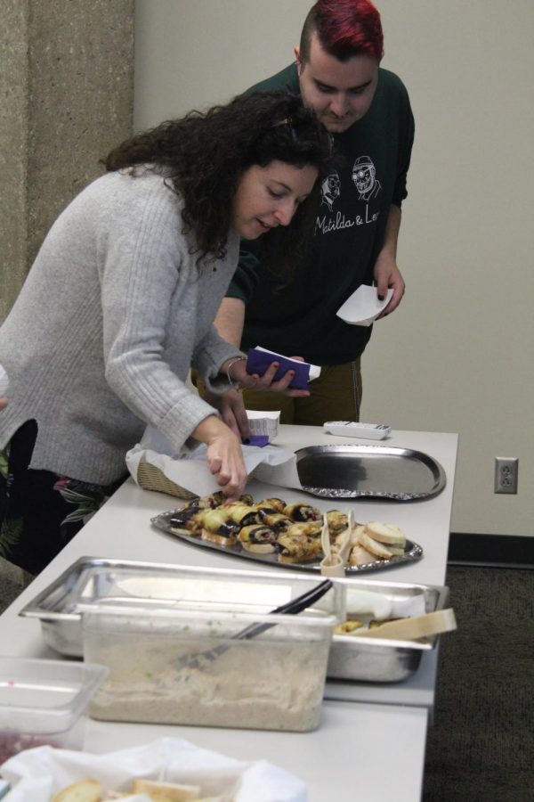 Students learn to cook Badrijani Nigivit with Nino Omatee in the basement of Maucker Union on Tuesday, Nov. 16.