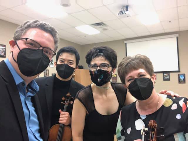 UNIs faculty string quartet was featured at the orchestras concert Friday night. The quartet members include Sang Koh, Erik Rohde, Julia Bullard and Hannah Holman.