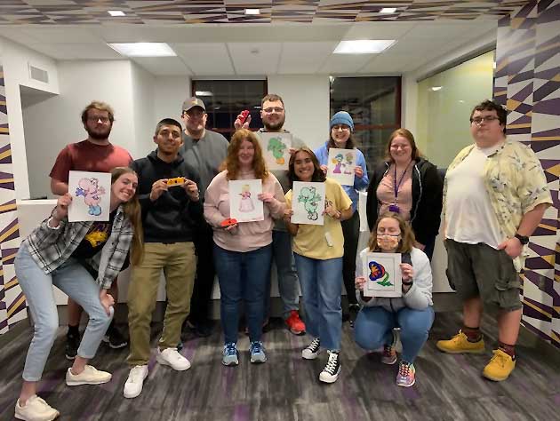 Attendees of the TAIG event showed off their colorful pictures of various Mario Kart characters. 