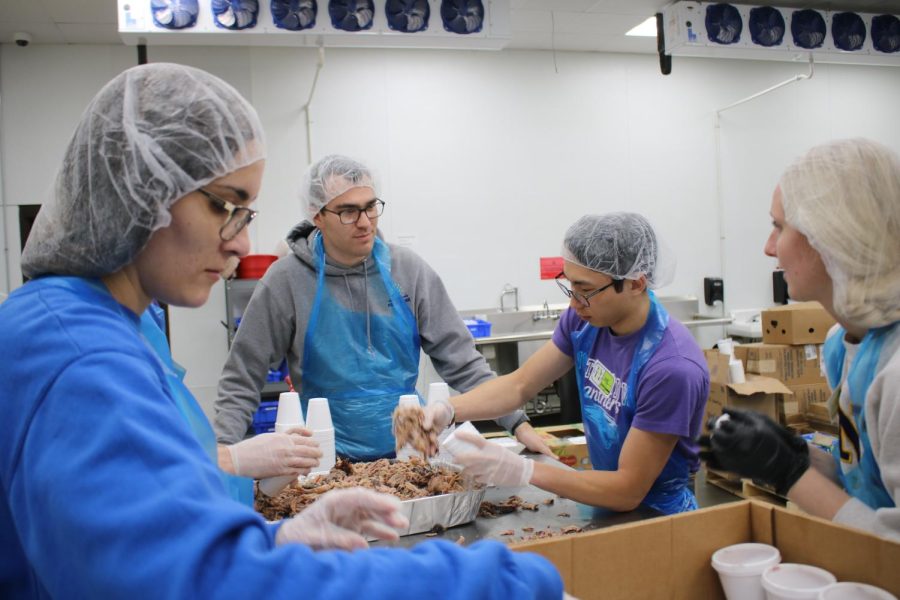Students volunteer hands-on as part of their service-leading project. As a group, they raised money to provide 10,000 meals for those in need.
