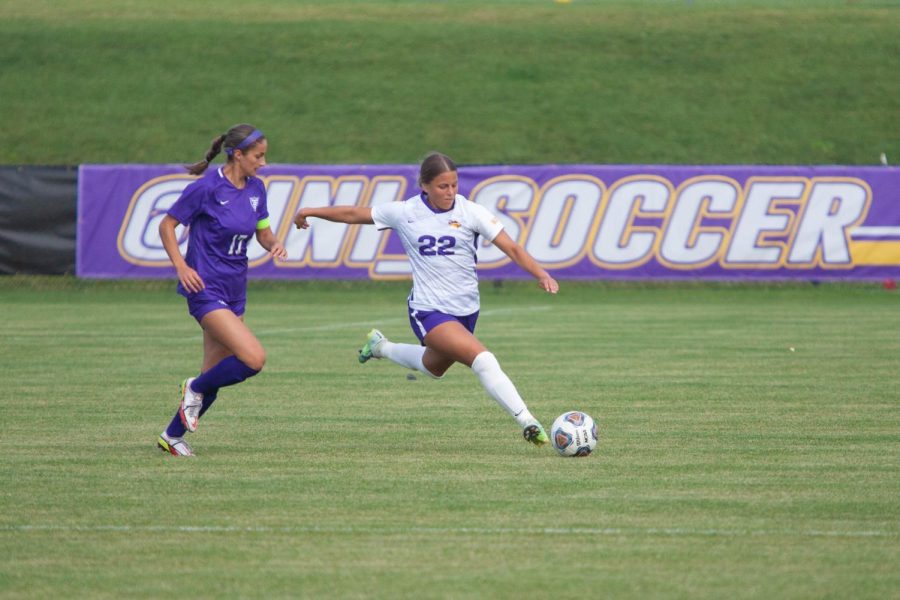 Macy Smith (22) prepares to kick the ball for UNI. The Panthers fell to Iowa on Sunday, 6-0. All six goals were scored during the opening half. 