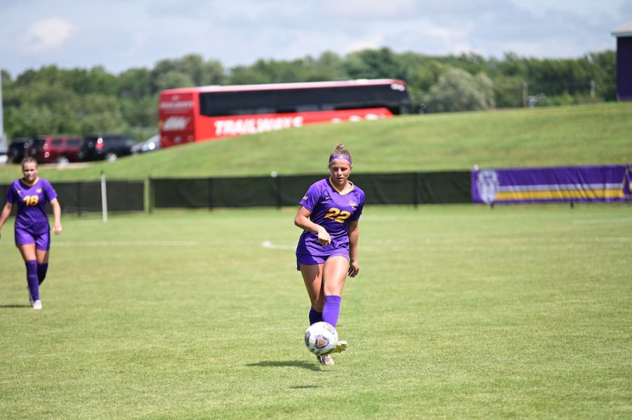 Macy Smith (22) brings the ball up the field. UNI will be back in action on Sunday when they host Iowa. 