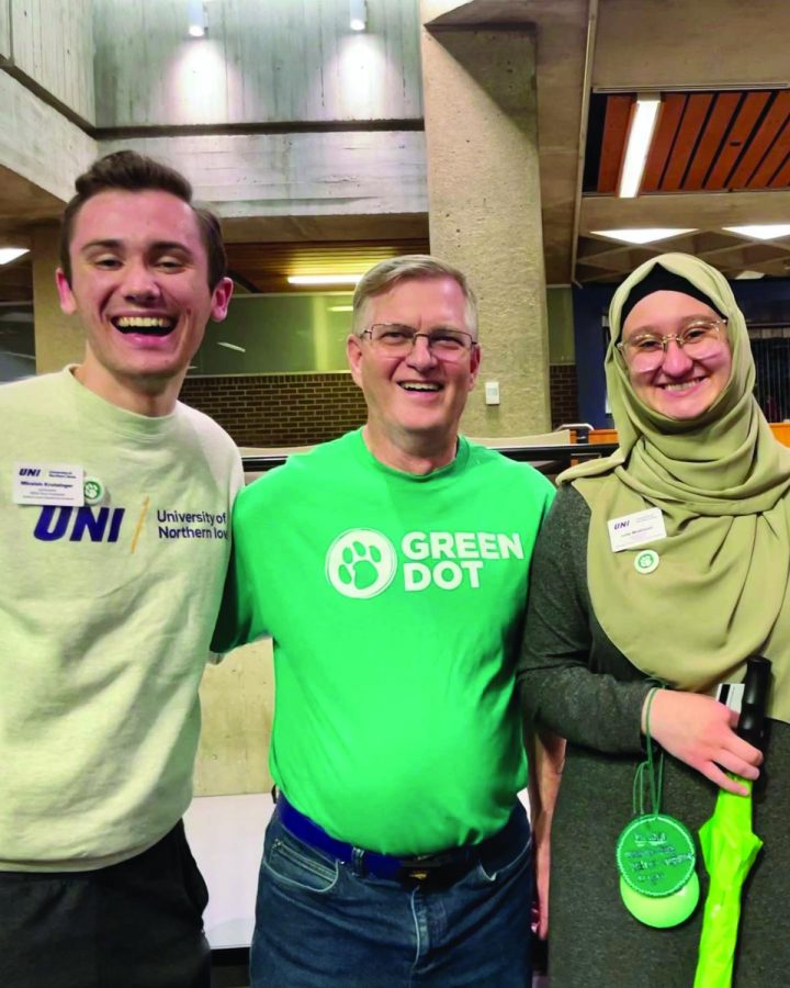 NISG passed a resolution formally recognizing Green Dot Week celebrating the launch of the new gender violence prevention initiative. Above NISG President Masinovic and Vice President Krutsinger pose with University President Mark Nook at the kickoff event. 